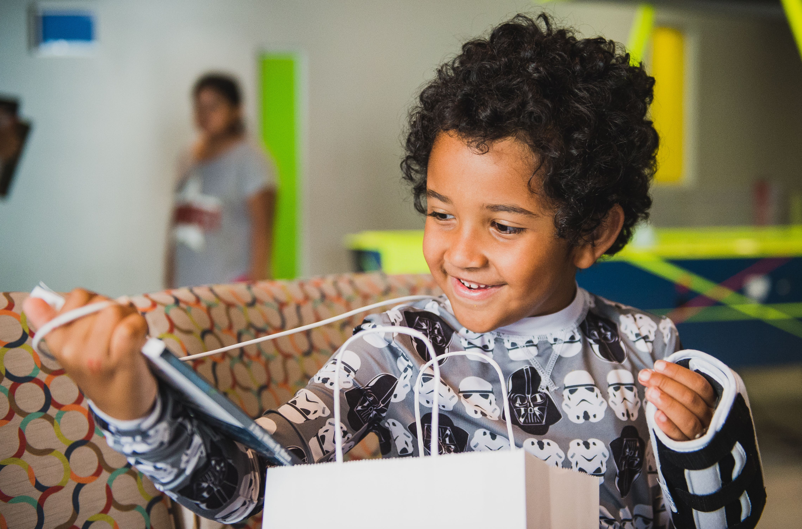 A young patient receiving a comfort gift.